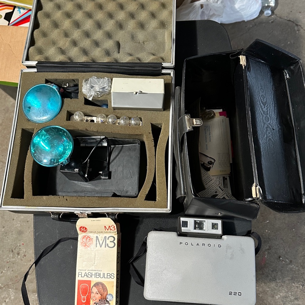 Polaroid Camera with Red and Silver Accents